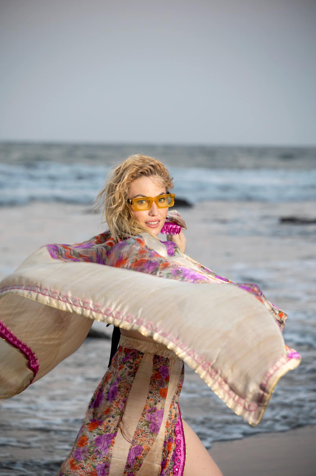 Beach editorial photo with floral kimono